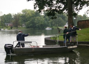 Residents Doug Carney from IDNR and Dr. Chris Theodorkis from SIUE as they collect fish to be counted, measured and released back into Dunlap Lake Thursday, Sept. 7. A few fish of varying types and sizes were kept for the SIUE Environmental Science Department to test for toxins thanks to a grant from the Urban Institute. 